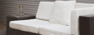 plain white and brown wicker patio furniture with nothing around it